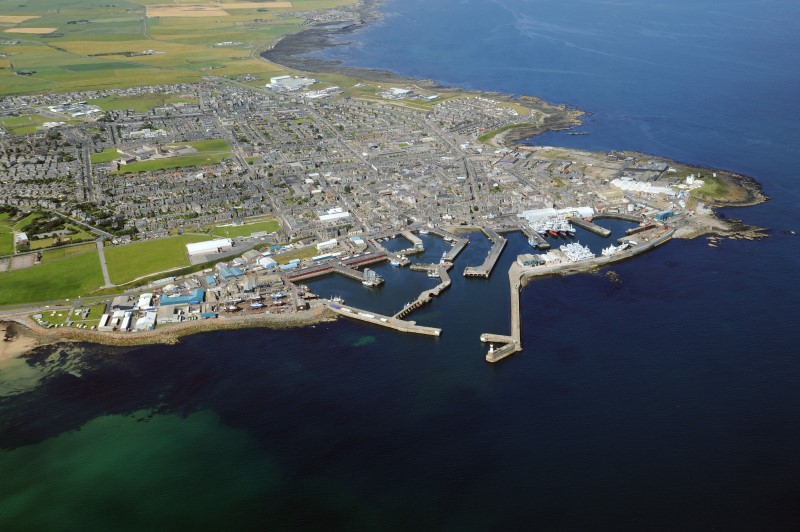 An aerial image of the town of Fraserburgh including harbour area and beach